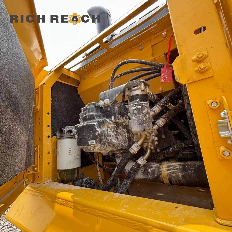 Front view of a 2018 Komatsu PC200 excavator, priced at $25,000